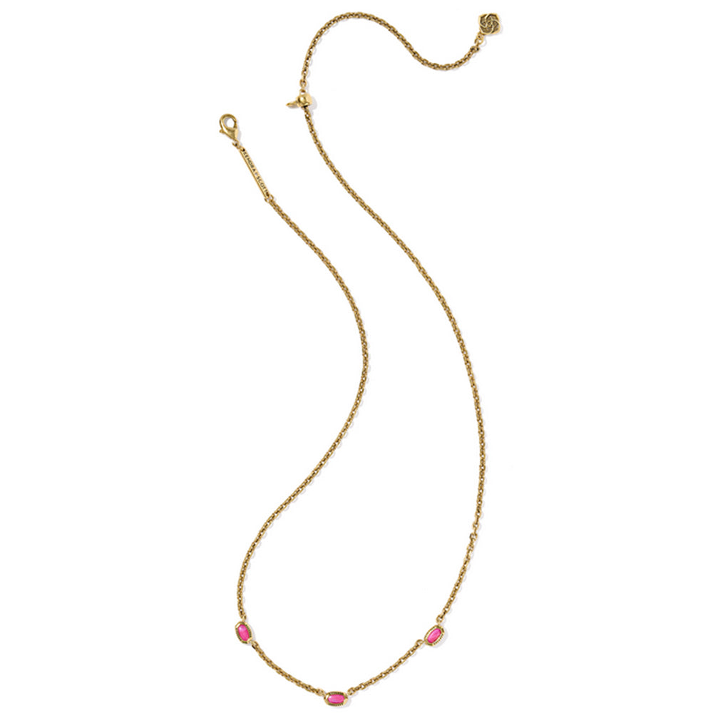 Gold necklace with pink stones on a white background