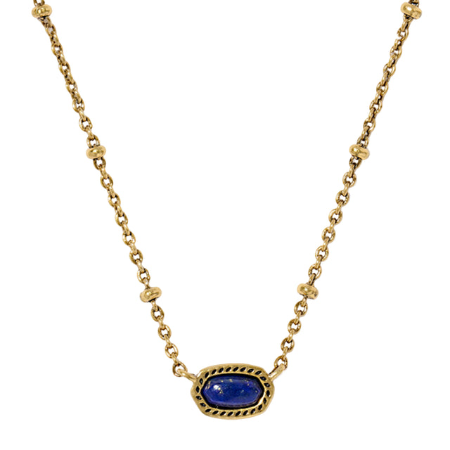 Gold necklace with a blue stone pendant on a white background