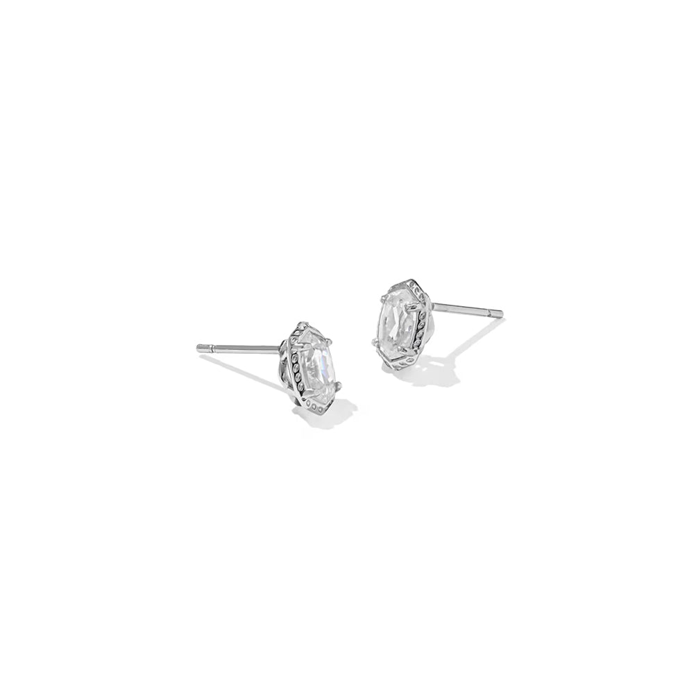 A pair of silver stud earrings with marquise-cut clear gemstones in a textured bezel setting, shown on a plain white background.