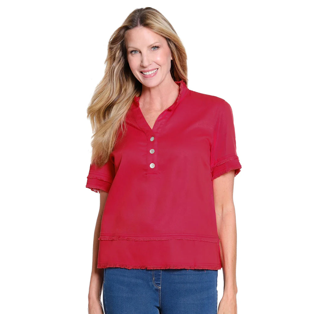 Woman wearing a red short-sleeve shirt with buttons on a white background