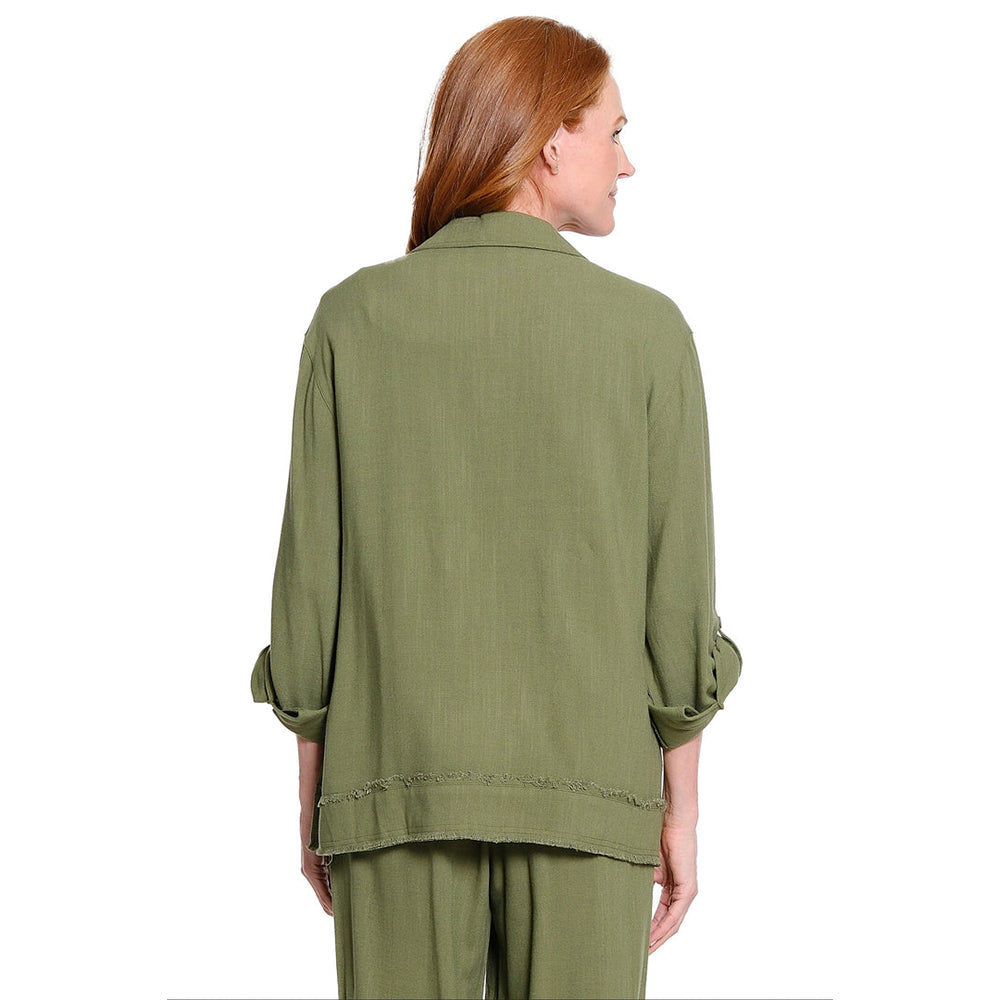 A woman with red hair is shown from the back wearing an olive green linen-blend top and matching pants against a plain white background.
