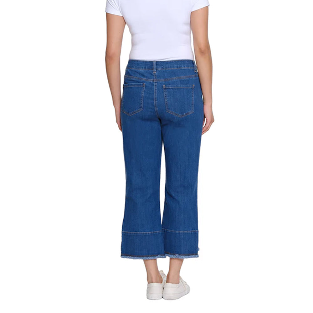 Person wearing blue jeans and a white shirt on a white background