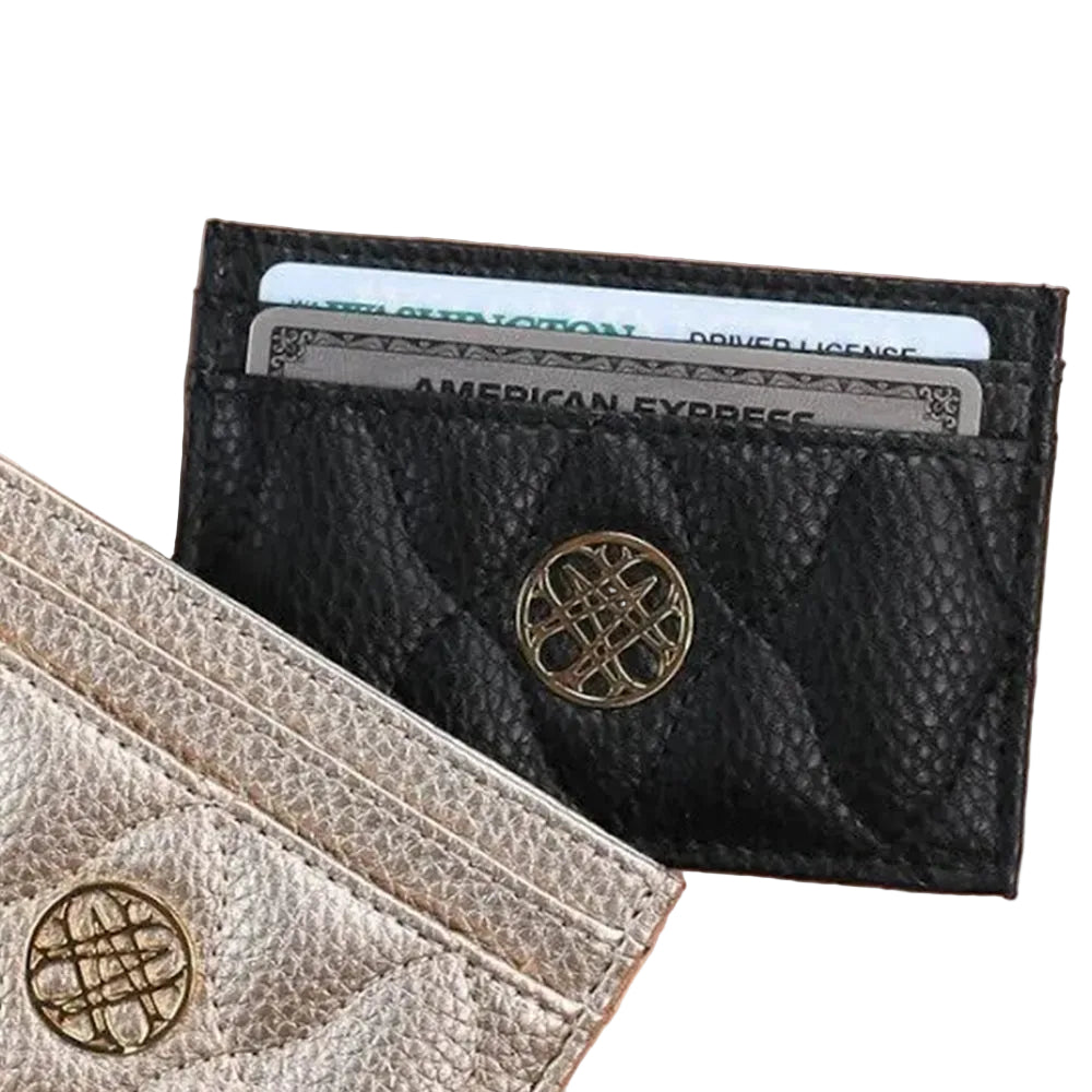 Black leather wallet with gold emblem on a beige background
