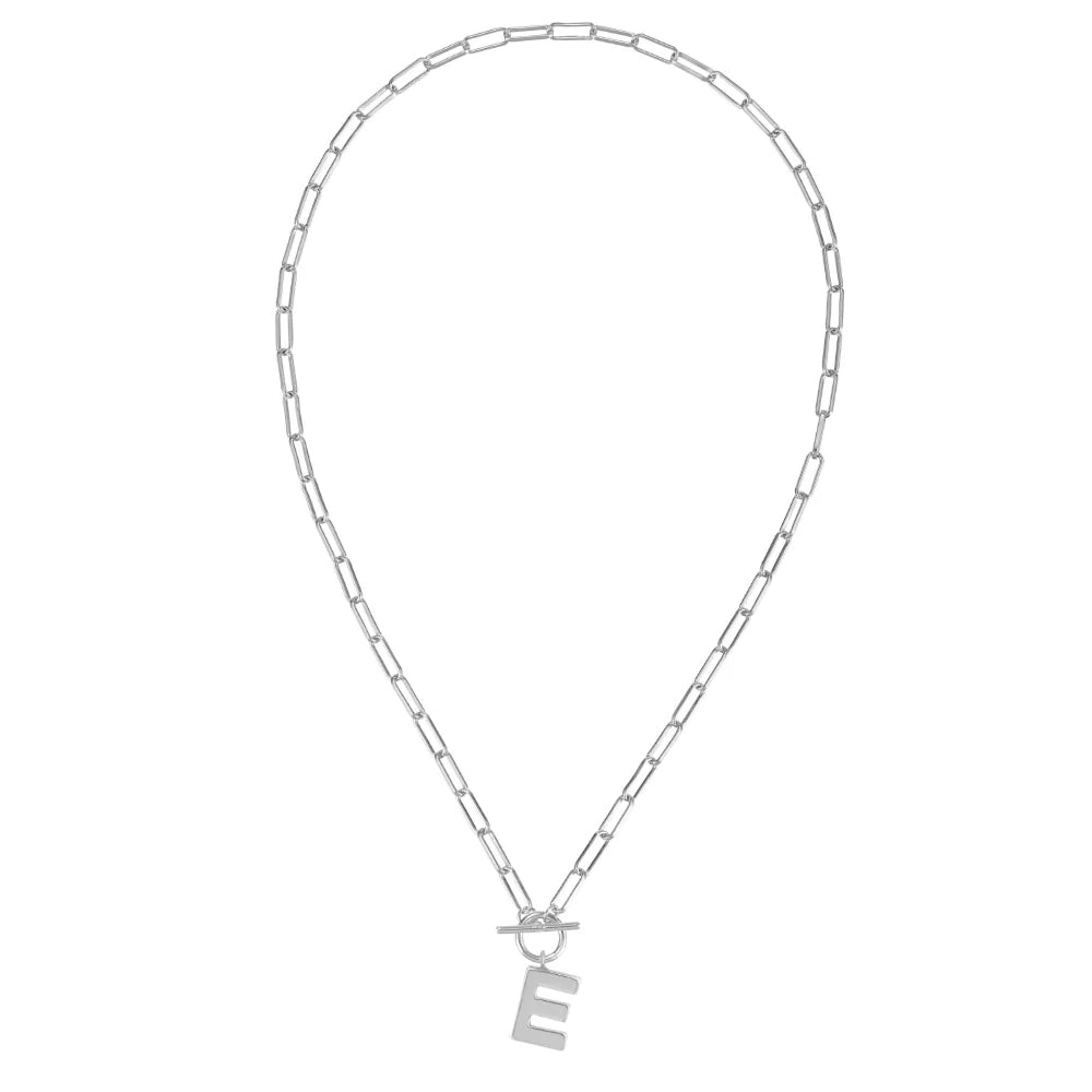 Silver necklace with a letter 'E' pendant on a white background