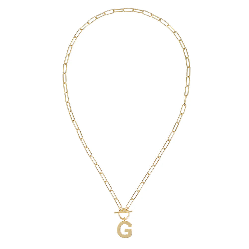 Gold chain necklace with a letter 'G' pendant on a white background