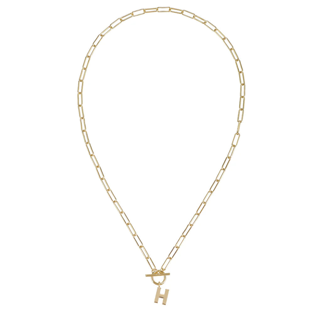 Gold chain necklace with a small gold 'H' pendant on a white background
