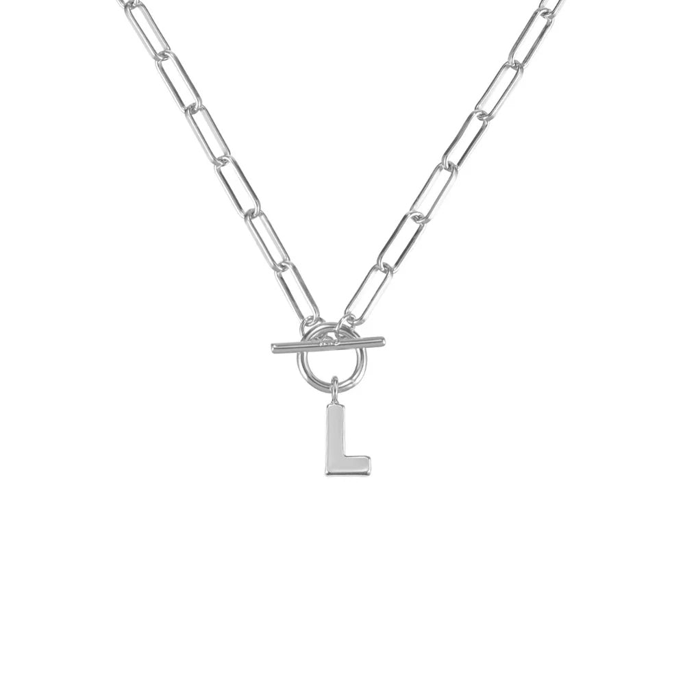 Silver necklace with a toggle clasp and 'L' pendant on a white background