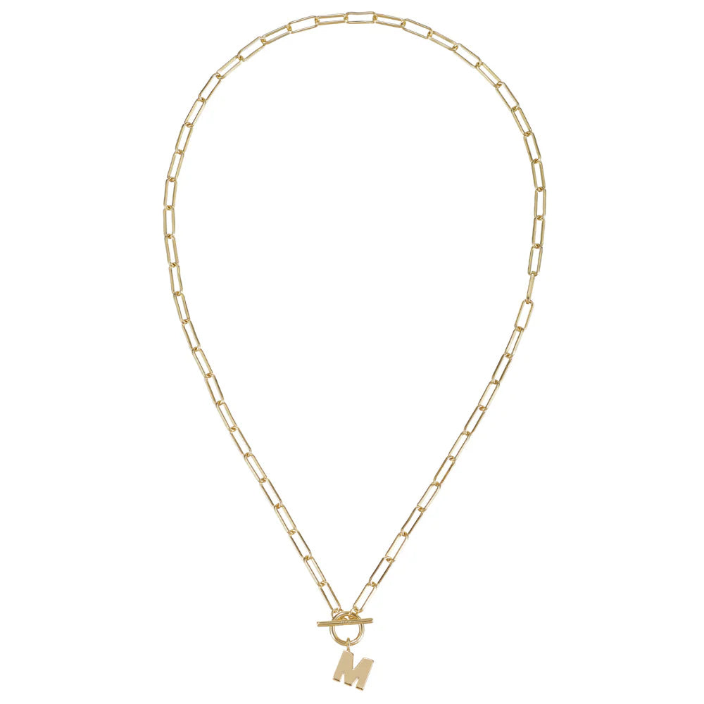 Gold necklace with a 'M' pendant on a white background