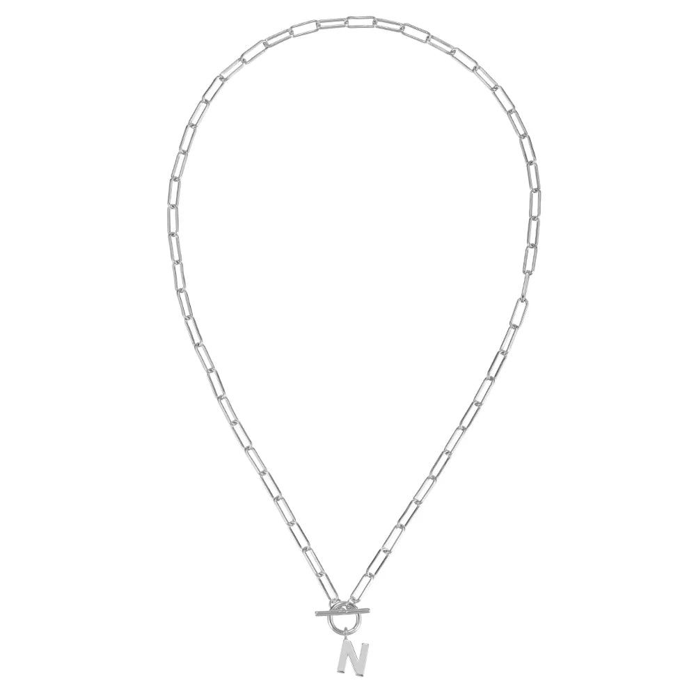 Silver chain necklace with a letter 'N' pendant on a white background