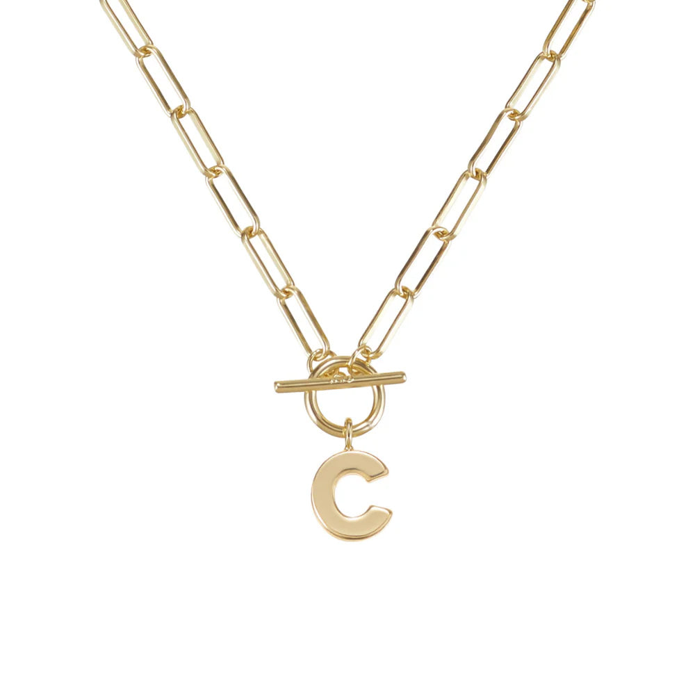 Gold necklace with a letter 'C' pendant on a white background