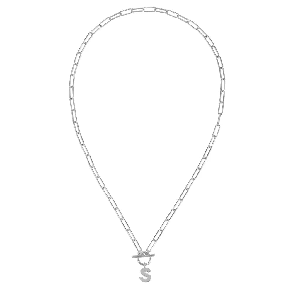 Silver necklace with a 'S' pendant on a white background