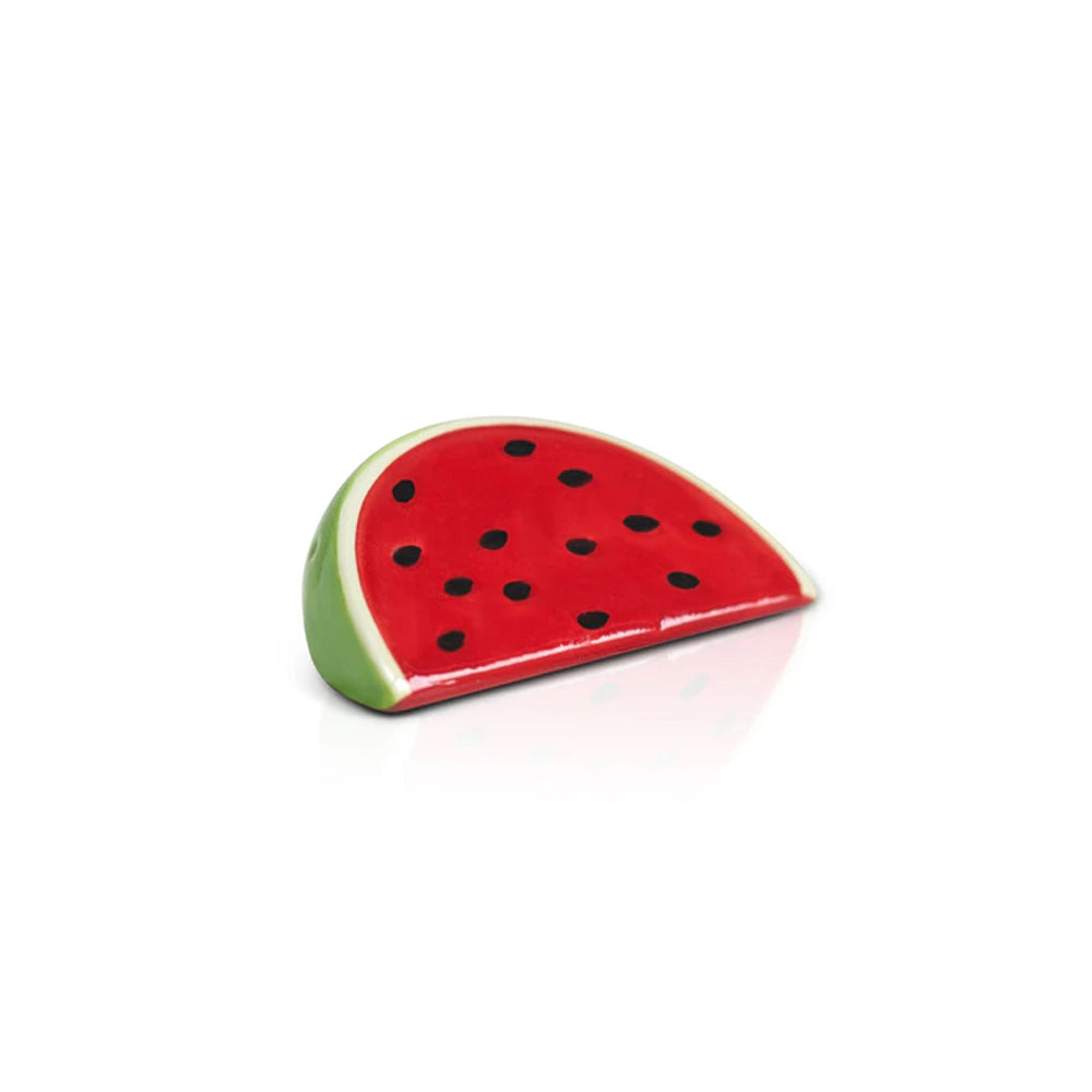 Sliced watermelon-shaped object on a white background