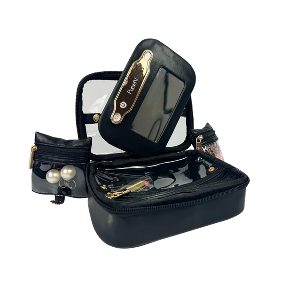 Black jewelry travel case with mirror and jewelry on a white background