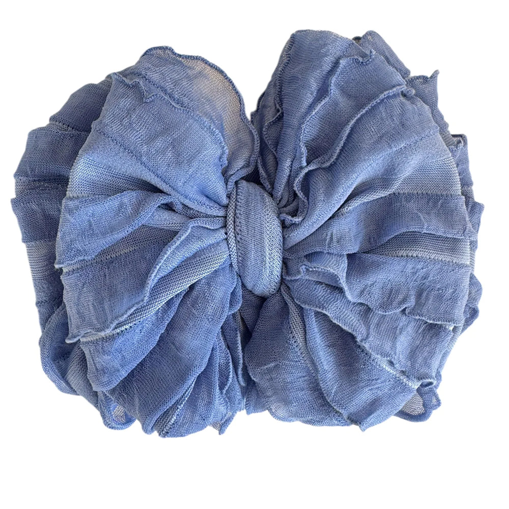 Blue fabric scrunchie on a white background