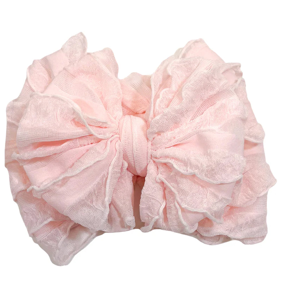 Large pink bow on a white background