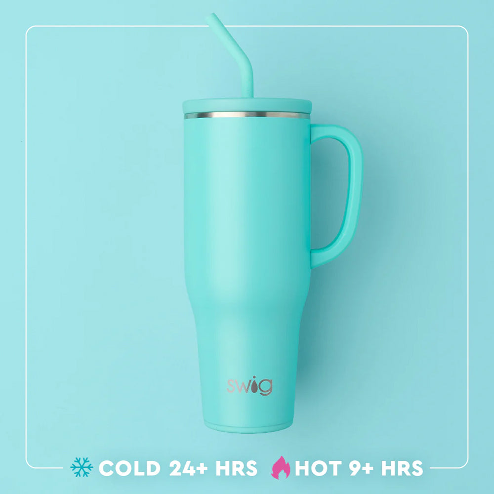 Turquoise mug with straw on a light blue background, featuring the Swig brand.