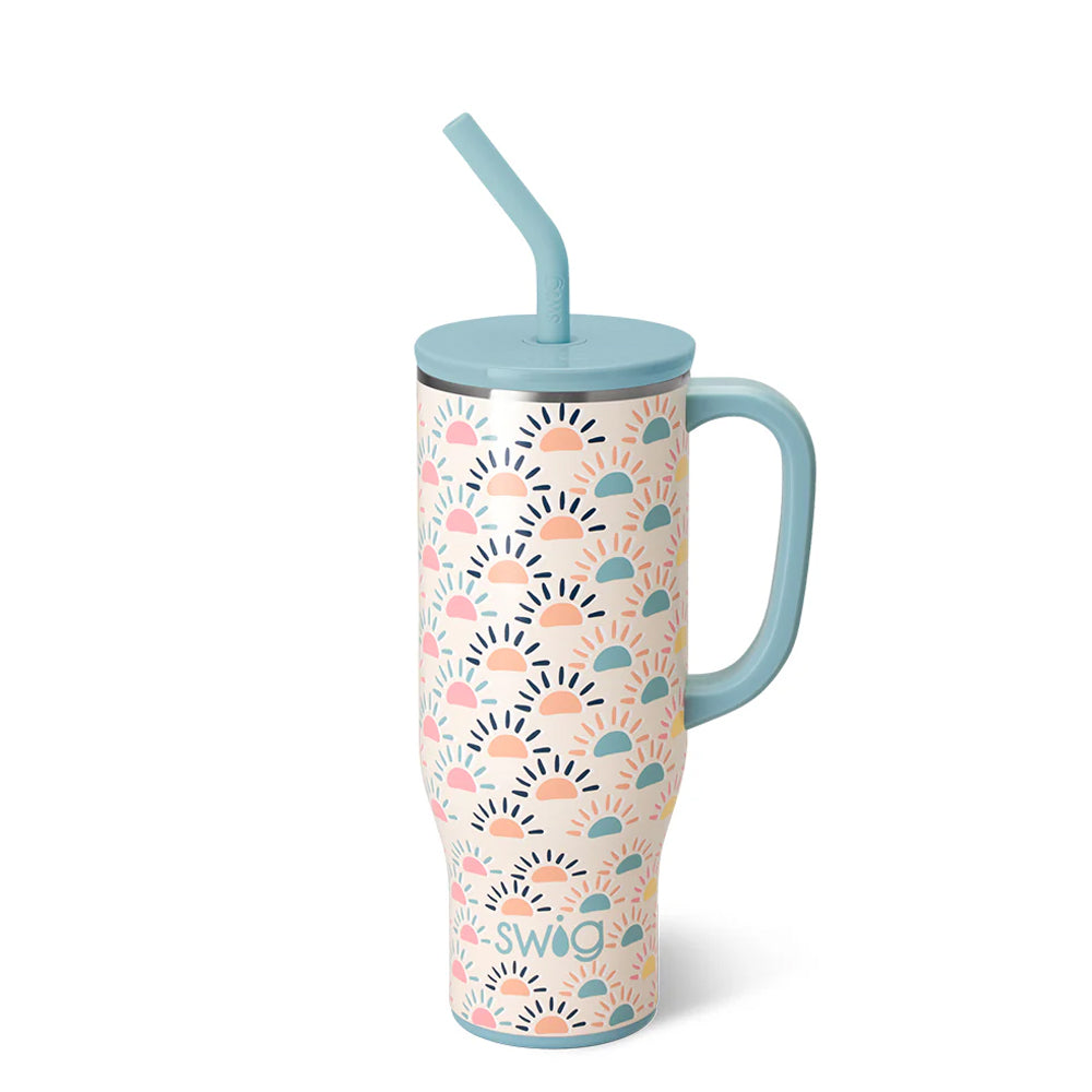 Tumbler with colorful pattern and blue lid and straw on a white background