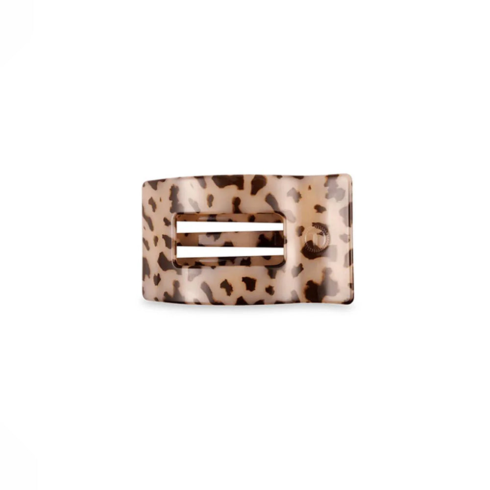 Leopard print hair clip on a white background