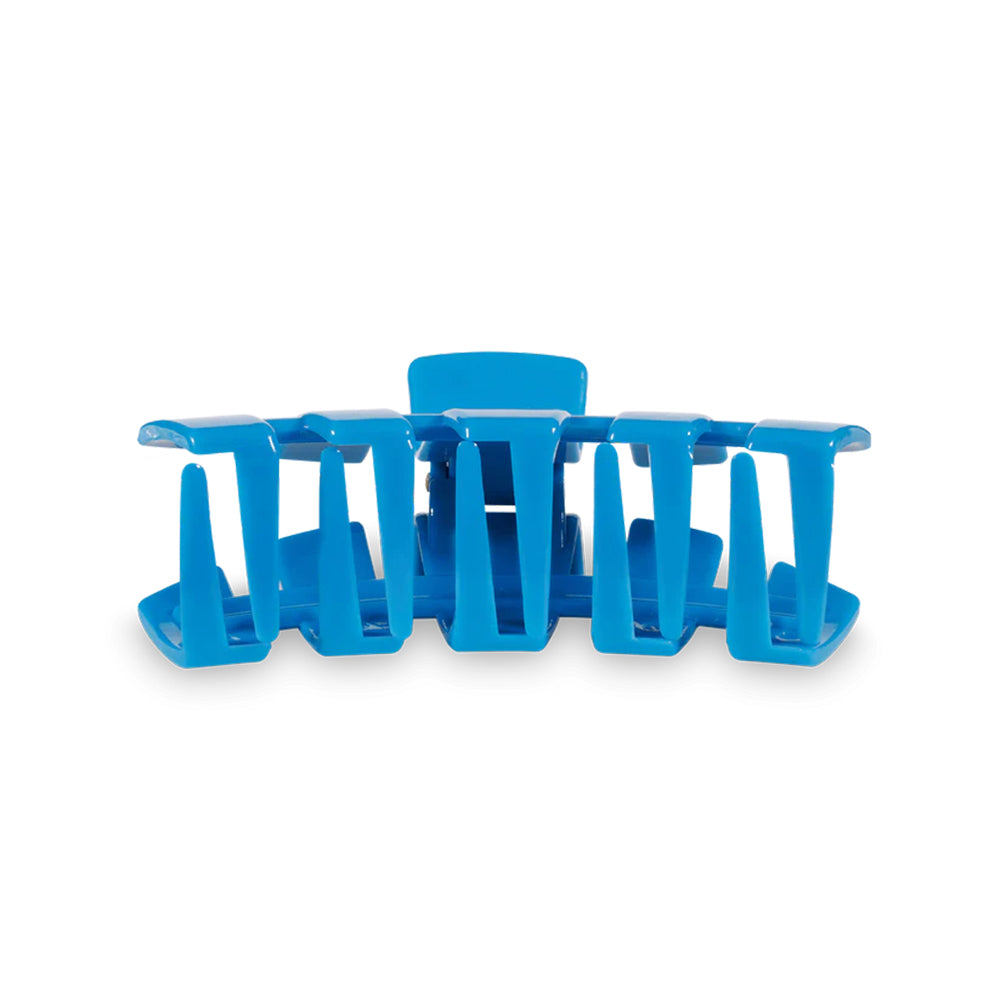 Blue hair clip on a white background
