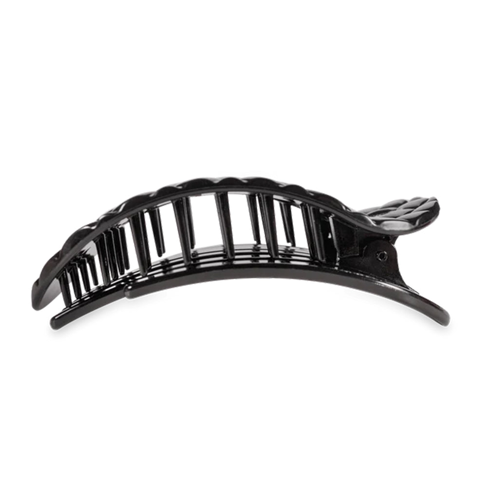 Black hair clip on a white background