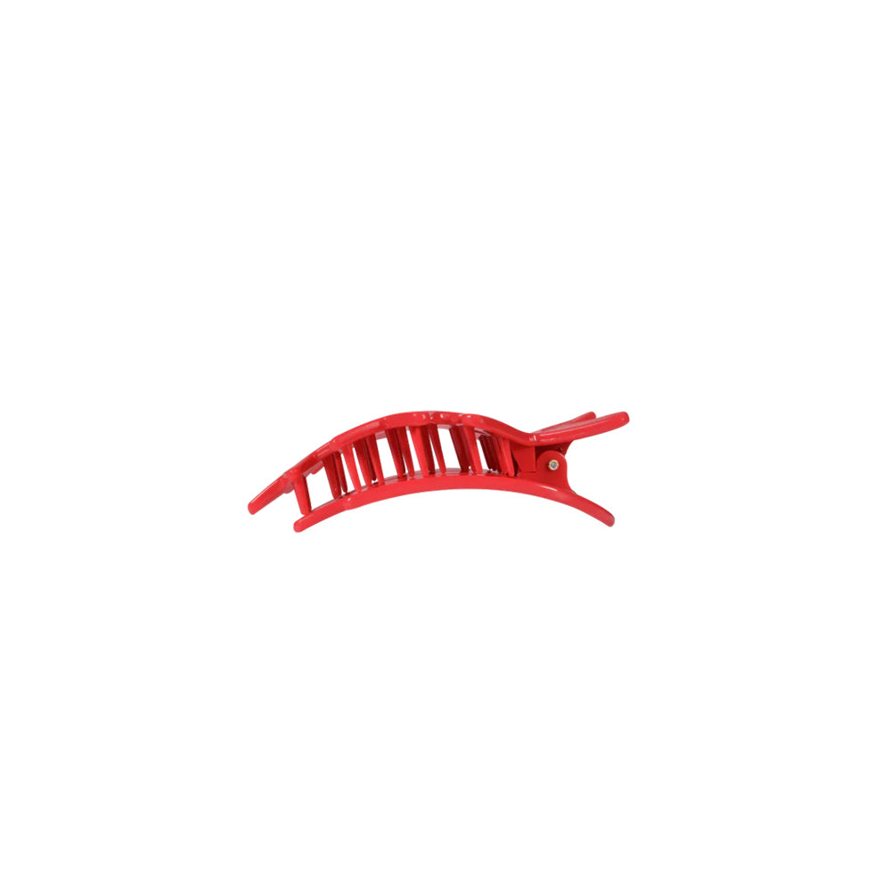 Red hair clip on a white background