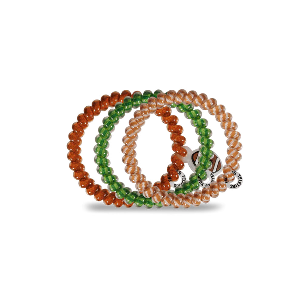 Set of three beaded bracelets in orange, green, and pink on a white background