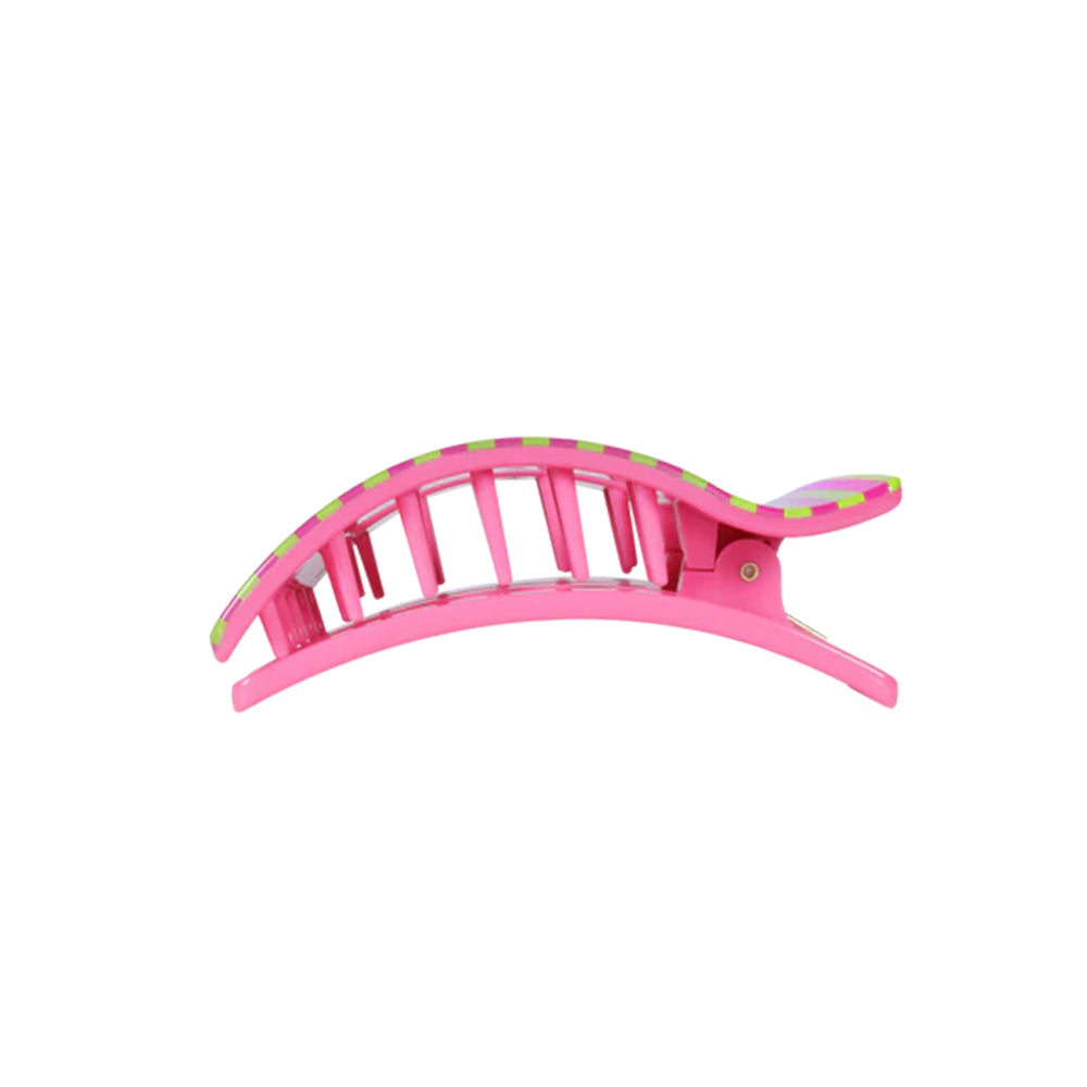 Pink hair clip with green accents on a white background