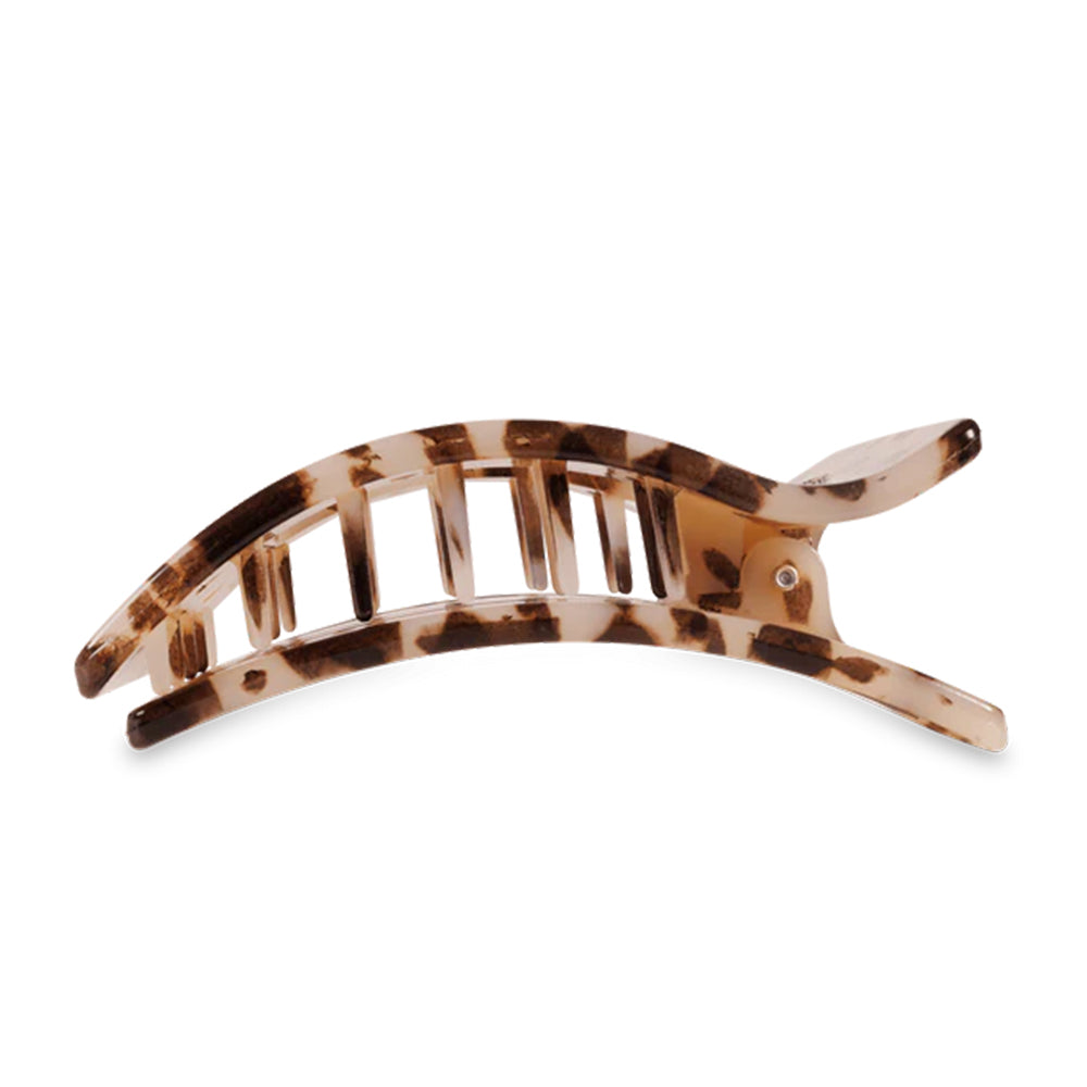 Tortoiseshell hair clip on a white background