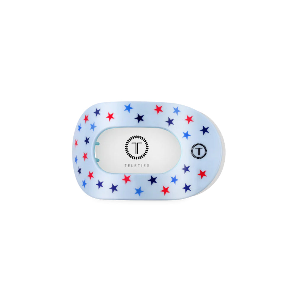 Teleties hair clip with star pattern on a white background