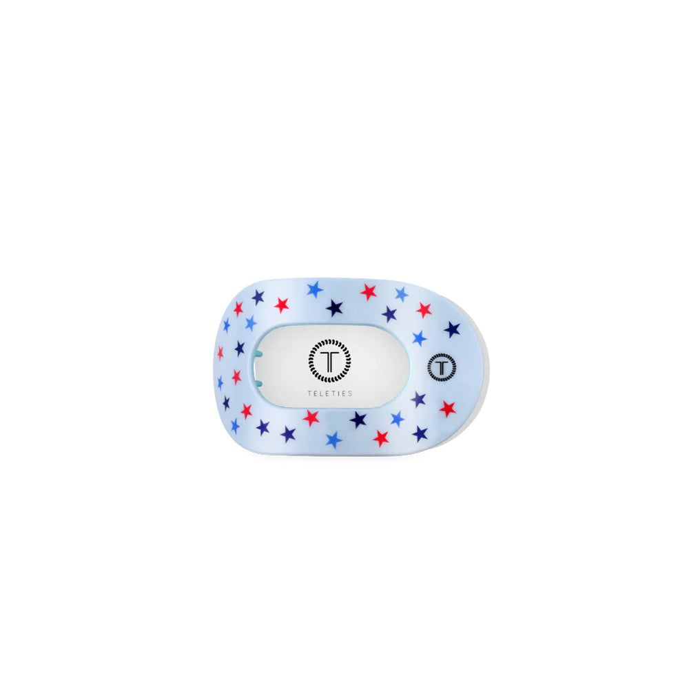 Small hair clip with star pattern on a white background