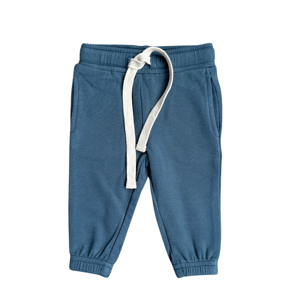 Blue children's sweatpants with a white drawstring on a white background