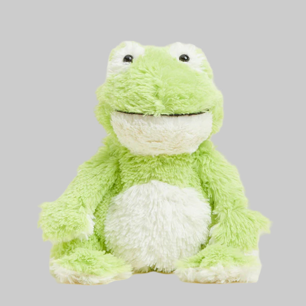 Green plush frog toy on a gray background
