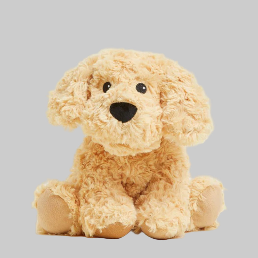 Plush dog toy with a black nose on a light gray background