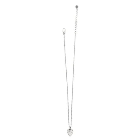 Silver necklace with a heart pendant on a white background