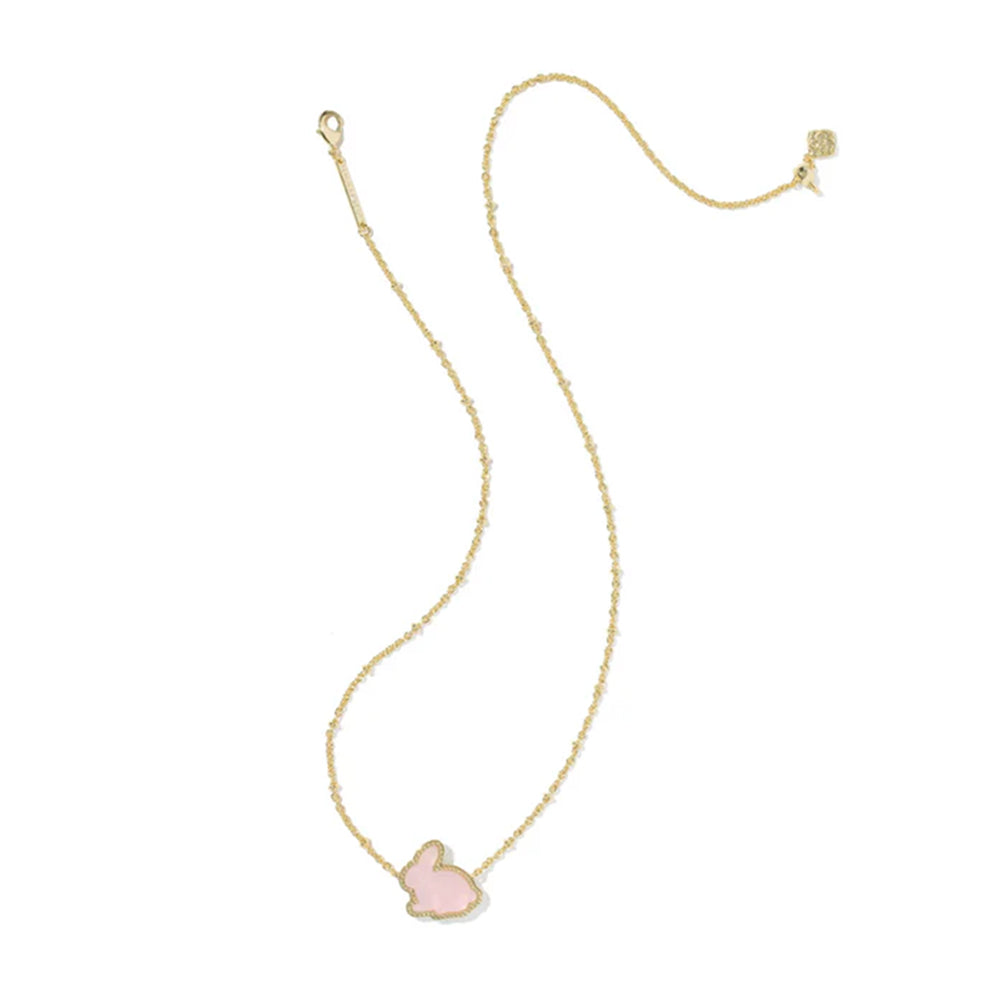 Gold necklace with a pink bunny pendant on a white background