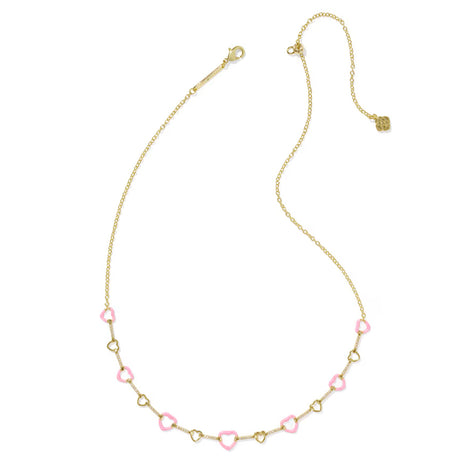Gold necklace with pink heart-shaped beads on a white background