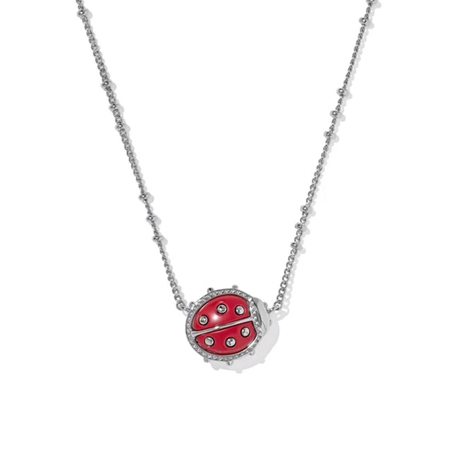 Necklace with a red ladybug pendant on a white background