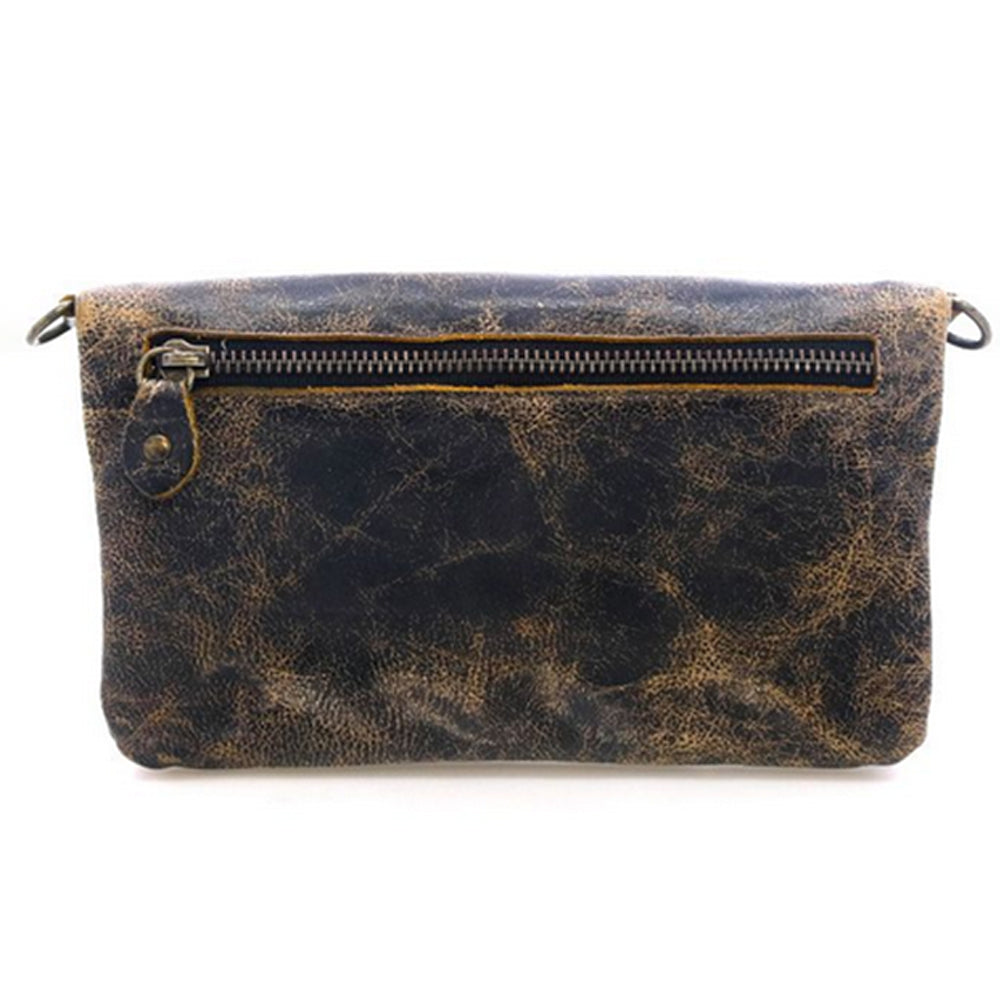 Worn leather clutch bag with a zipper on a white background