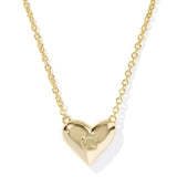 Gold heart-shaped necklace with a visible brand logo on a white background