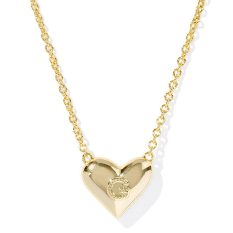 Gold heart-shaped necklace with a visible brand logo on a white background