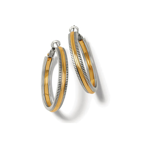 Pair of silver and gold hoop earrings on a white background
