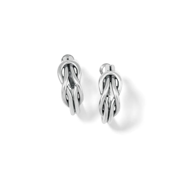 Pair of silver earrings on a white background