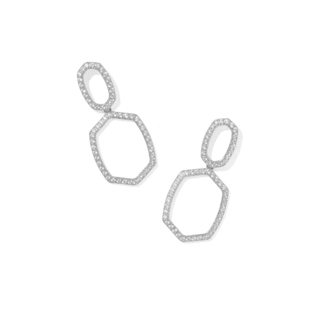 Pair of silver geometric earrings on a white background