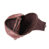 Brown leather waist bag with open front pocket on a white background