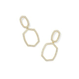 Gold earrings with geometric design on a white background