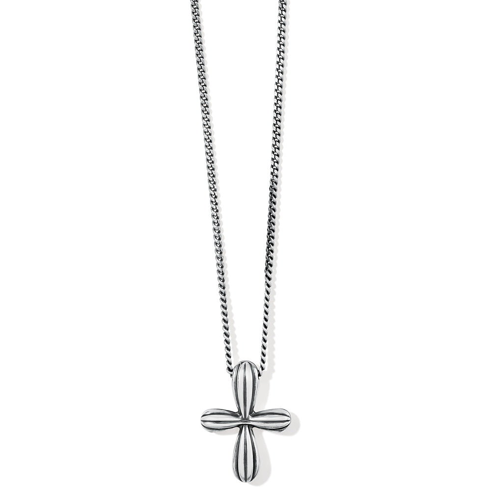 Silver cross pendant on a chain against a white background