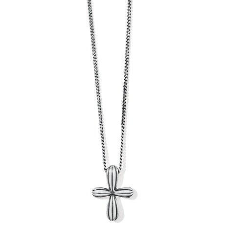 Silver cross pendant on a chain against a white background