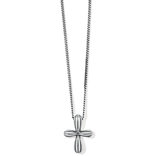 Silver cross pendant on a chain against a white background