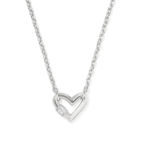 Silver heart-shaped pendant necklace on a white background