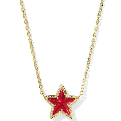 Gold necklace with a red star pendant on a white background